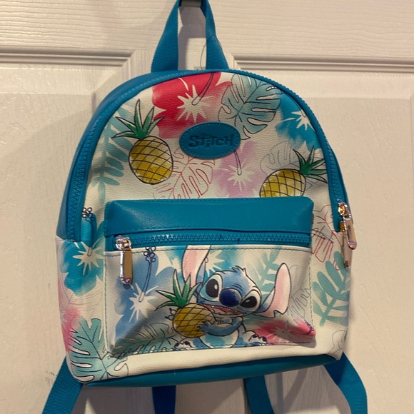 Disney Handbags - BNWT Disney Stitch Pineapple Mini Backpack